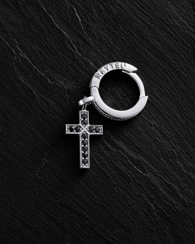 14k white gold single earring CROSS. BLACK STONES