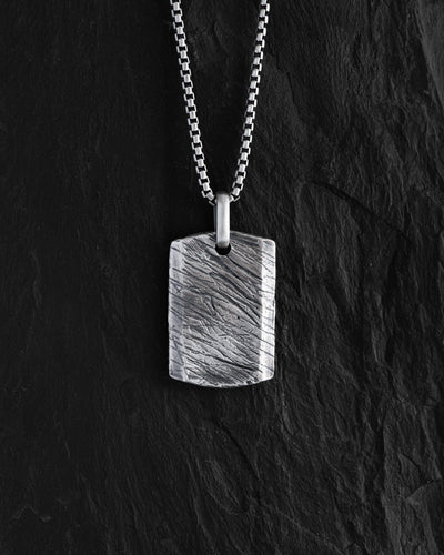 Silver dog tag SCAR