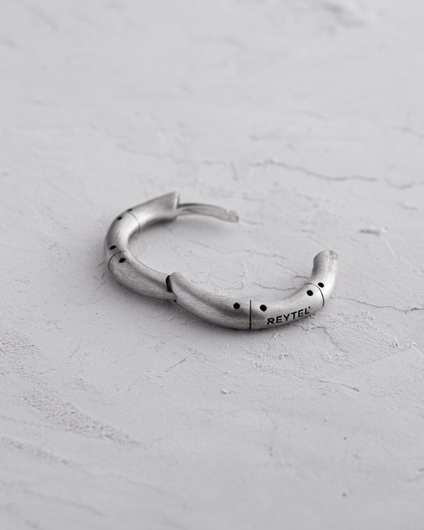 Silver single earring TRIN