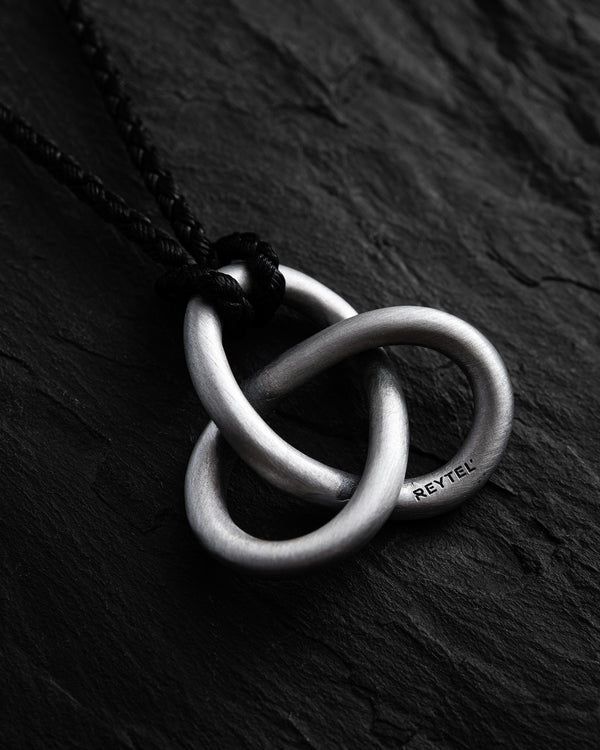 Silver pendant TRINITY (on a cord)
