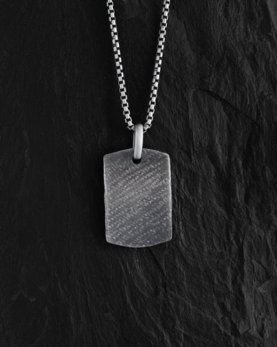 Silver dog tag SCAR