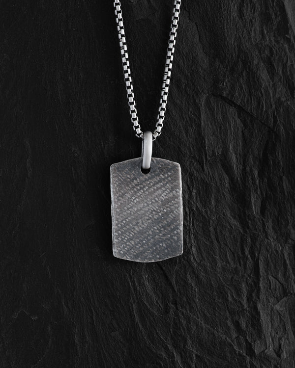 Silver dog tag SCAR