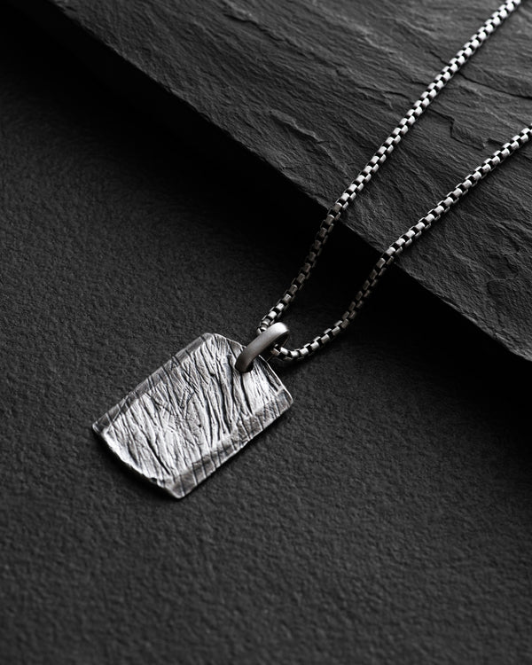 Silver dog tag SCAR