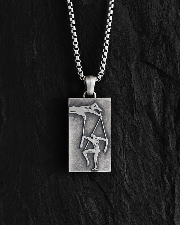 Silver pendant THE PUPPETEER