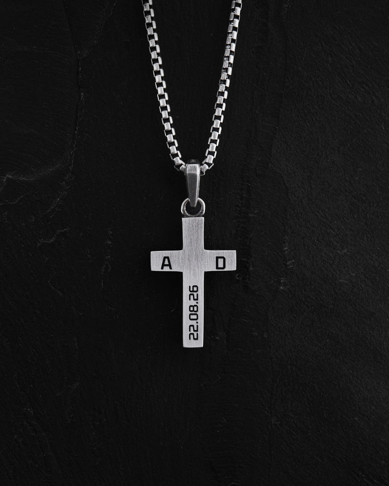 HELIGHET cross engraving example: initials and date