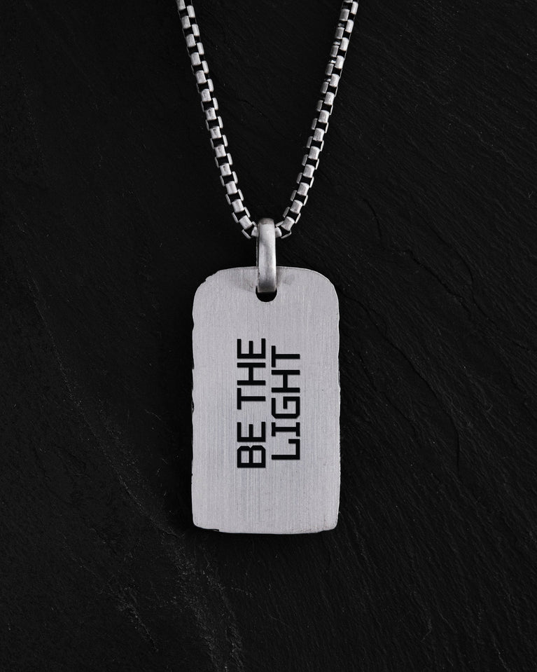VERDENS LYS pendant engraving example: BE THE LIGHT